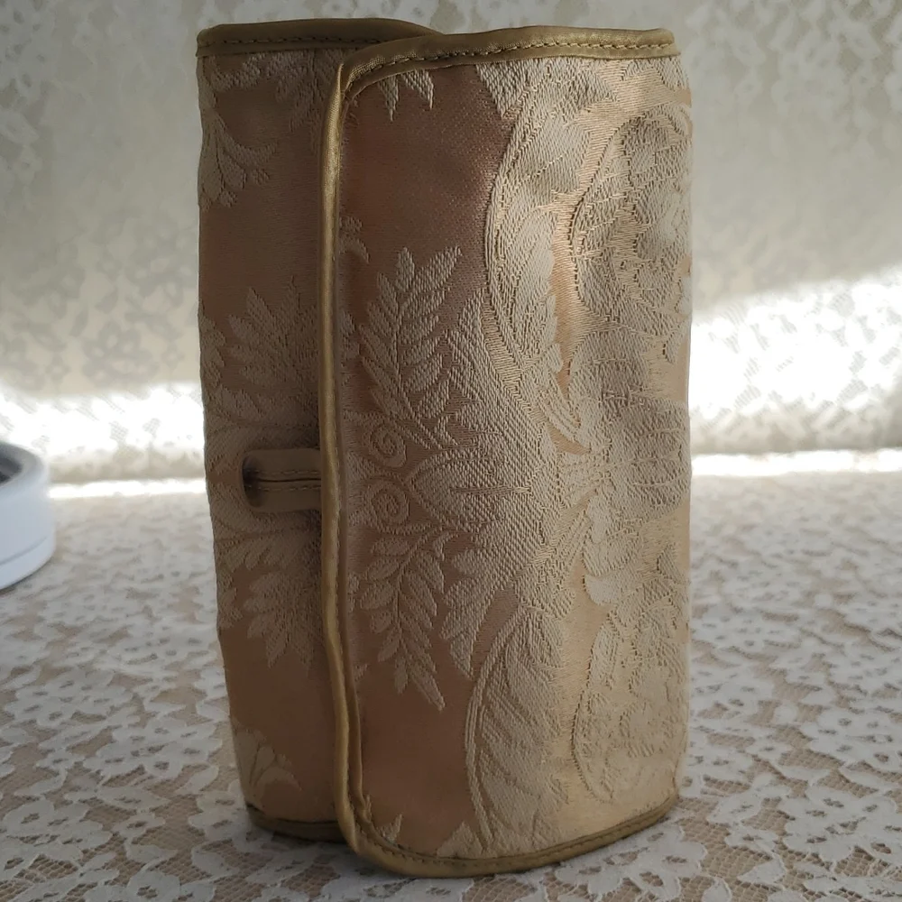 Gold Makeup or Jewelry travel bag. Hanging loop, 4 zipper compartments NWOT